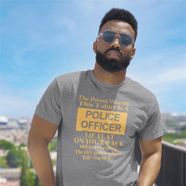 Alanah Pearce The Person Wearing This T Shirt Is A Police Officer Lie Flat On Your Back Shirts